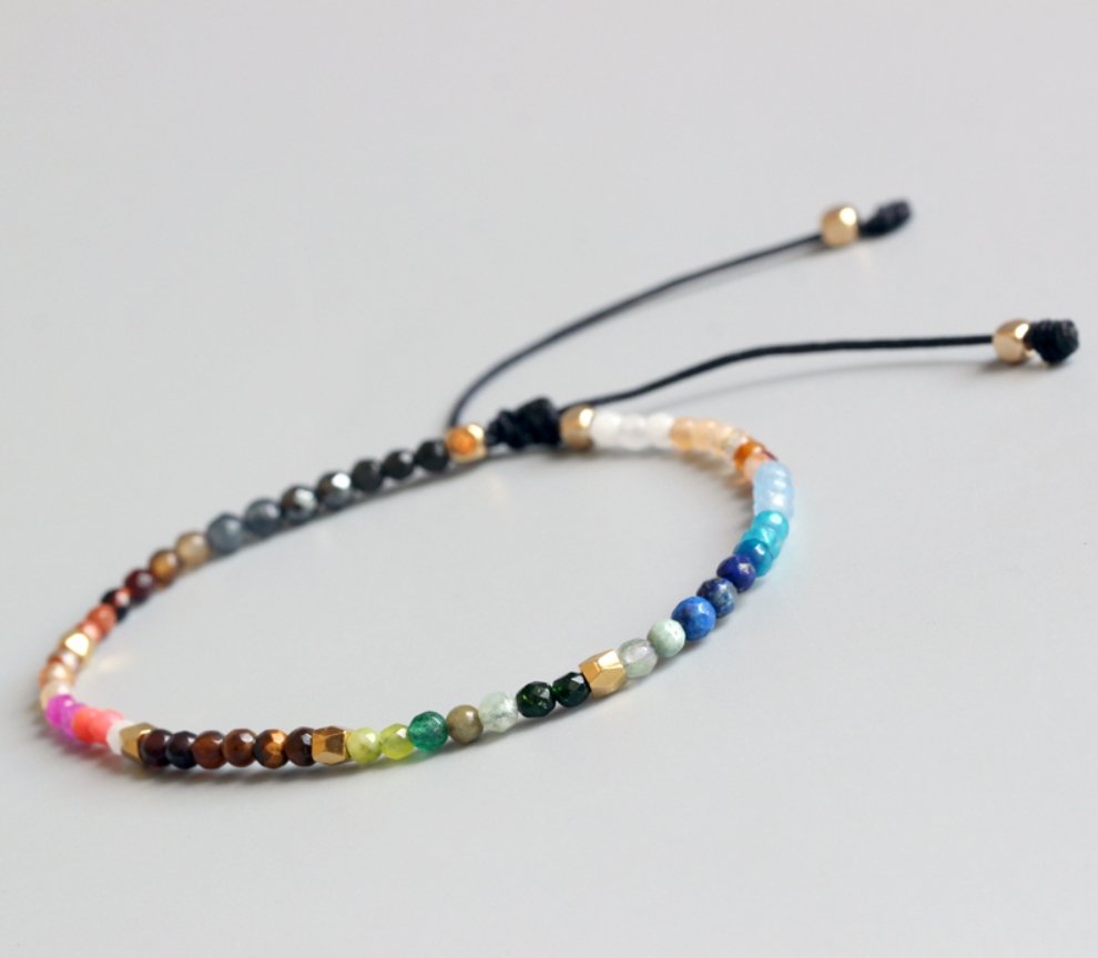 The natural stone beaded bracelet from Egret Jewellery laying on its side